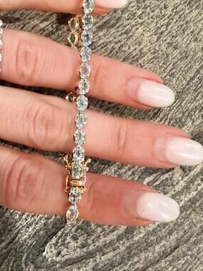 Affinity Gems Sterling Silver Rose Gold Plated Blue Topaz Tennis Bracelet